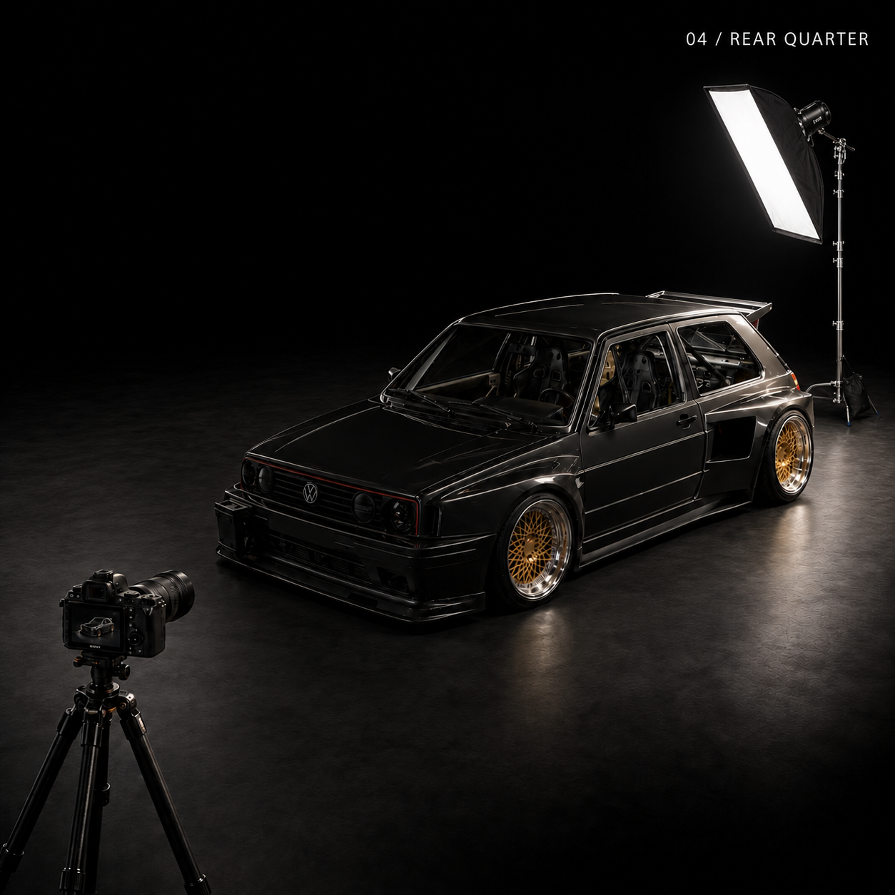 Studio lighting setup photographed from the rear quarter of the car
